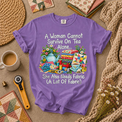 A Woman Cannot Survive On Tea Alone She Also Needs Fabric T-Shirt - Heather Team Purple
