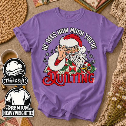 He Sees How Much You're Quilting Santa T-Shirt - Heather Team Purple