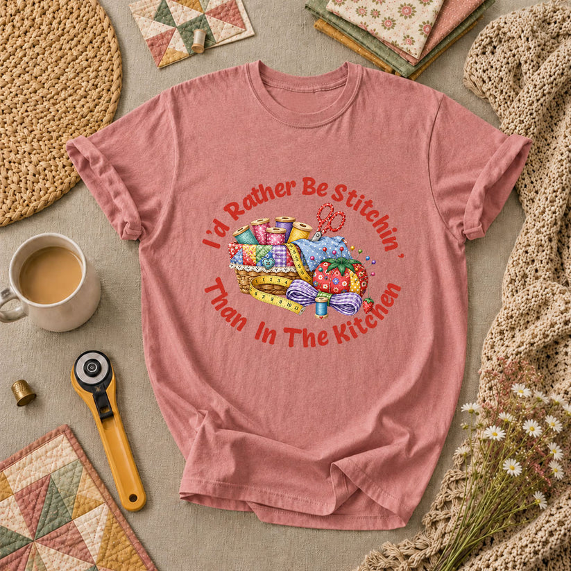 I'd Rather Be Stitchin' Than In The Kitchen T-Shirt - Heather Mauve