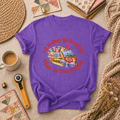 I'd Rather Be Stitchin' Than In The Kitchen T-Shirt - Heather Team Purple