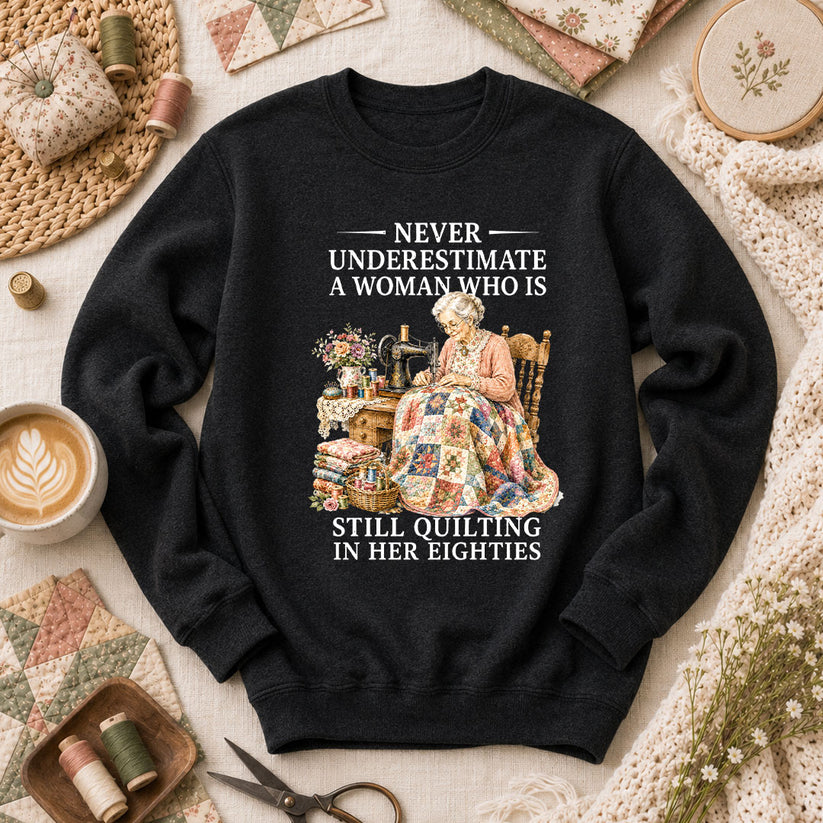 Never Underestimate A Woman Still Quilting Long Sleeve - Black