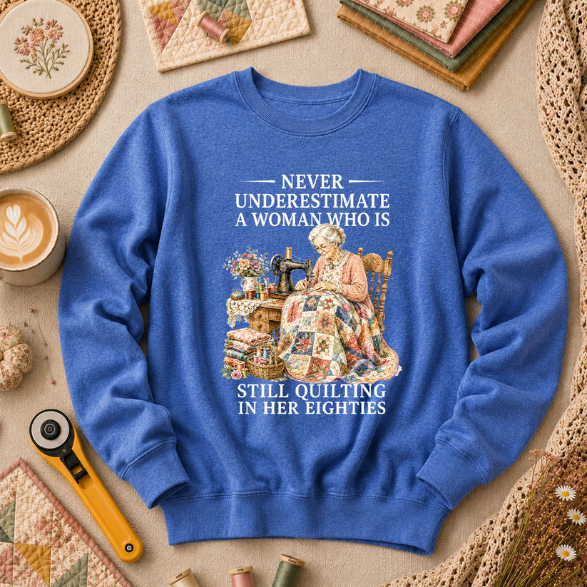 Never Underestimate A Woman Still Quilting Long Sleeve - Heather True Royal