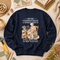 Never Underestimate A Woman Still Quilting Long Sleeve
