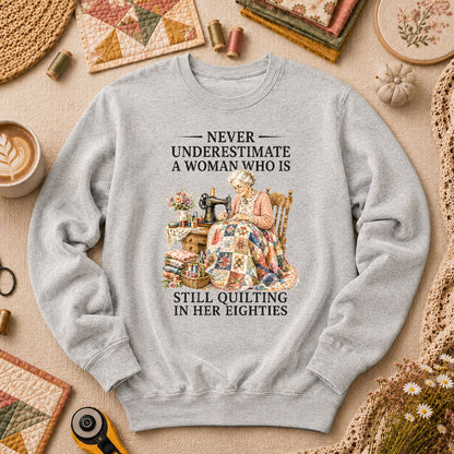 Never Underestimate A Woman Still Quilting Long Sleeve - Sport Grey