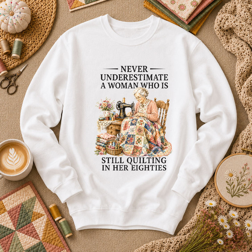 Never Underestimate A Woman Still Quilting Long Sleeve - White