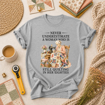 Never Underestimate A Woman Still Quilting T-Shirt - Athletic Heather