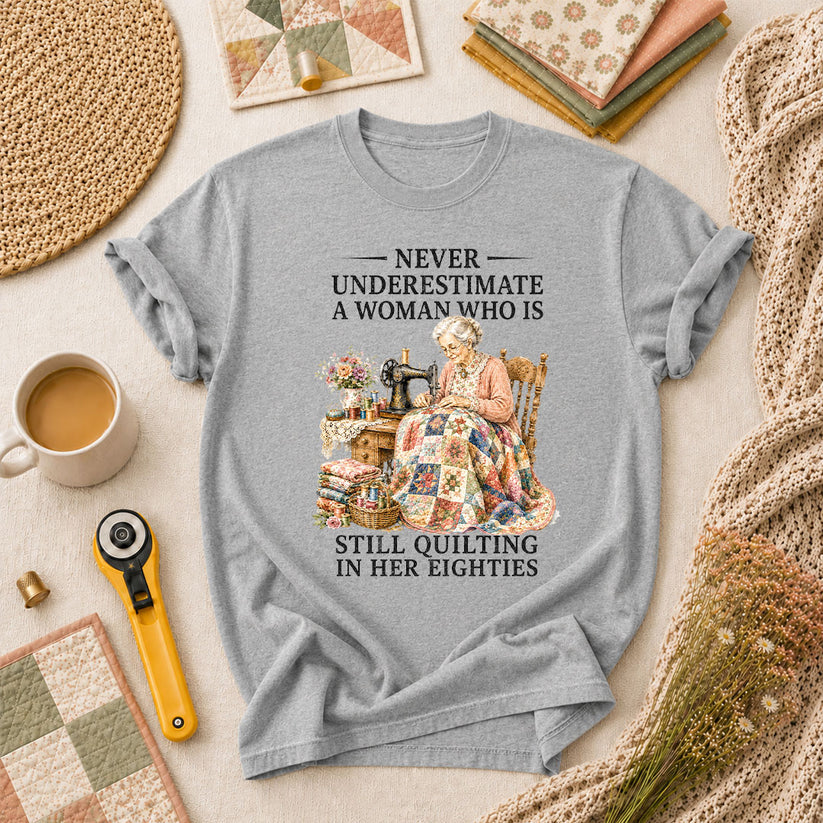 Never Underestimate A Woman Still Quilting T-Shirt - Athletic Heather