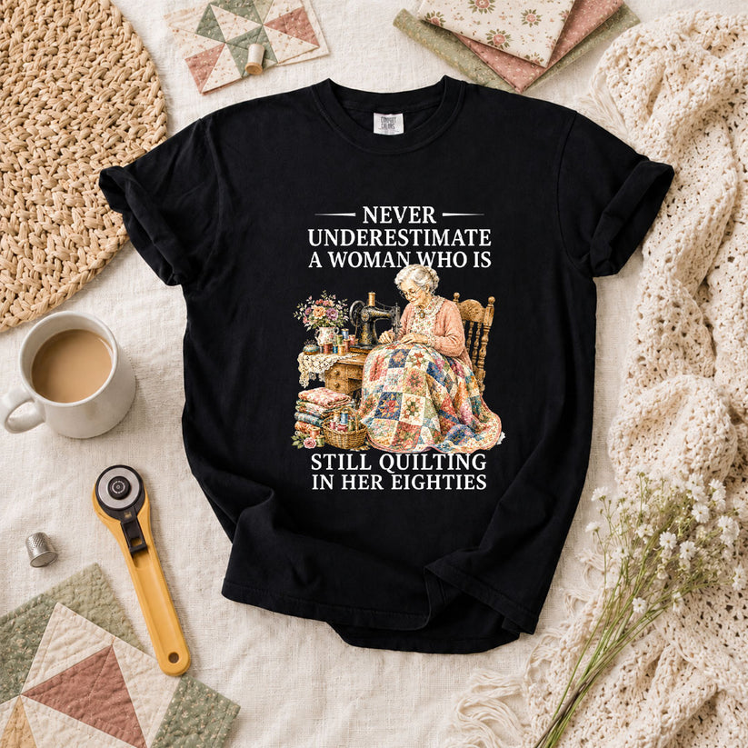 Never Underestimate A Woman Still Quilting T-Shirt - Black
