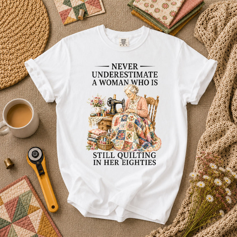 Never Underestimate A Woman Still Quilting T-Shirt - White