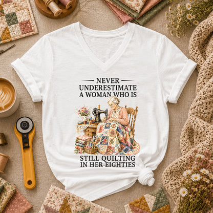 Never Underestimate A Woman Still Quilting Women's V-Neck - White