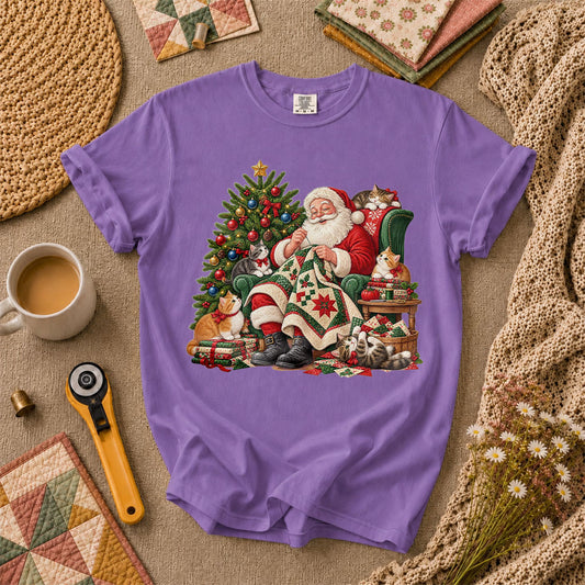Santa Quilter Sewing With Kittens By Christmas Tree T-Shirt - Heather Team Purple