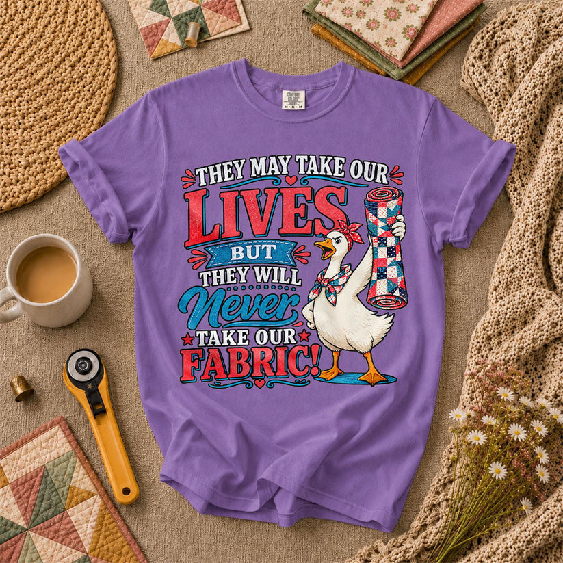 They May Take Our Lives But Never Our Fabric Duck T-Shirt - Heather Team Purple