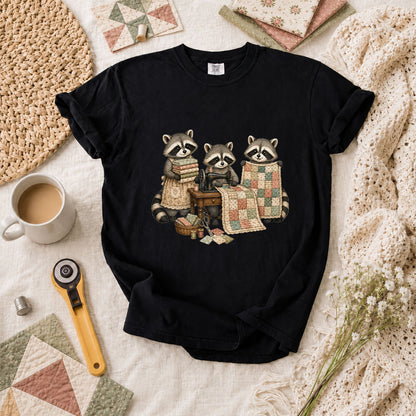 Three Raccoons Quilting Together Sewing Machine T-Shirt - Black